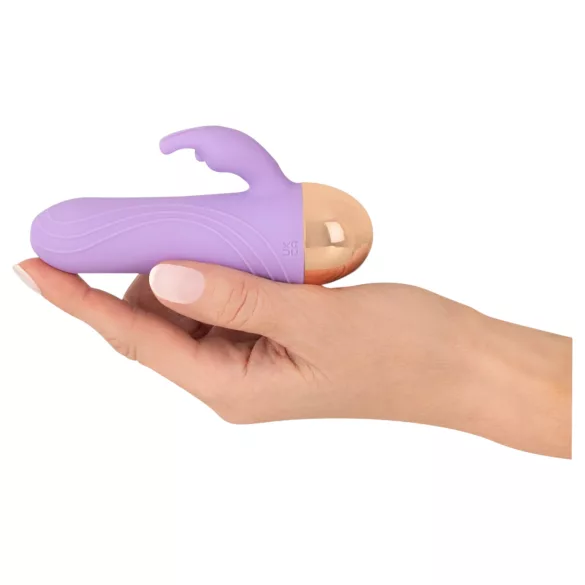 Cuties - oplaadbare, waterdichte mini vibrator met clitorisstimulatie‑arm (paars)